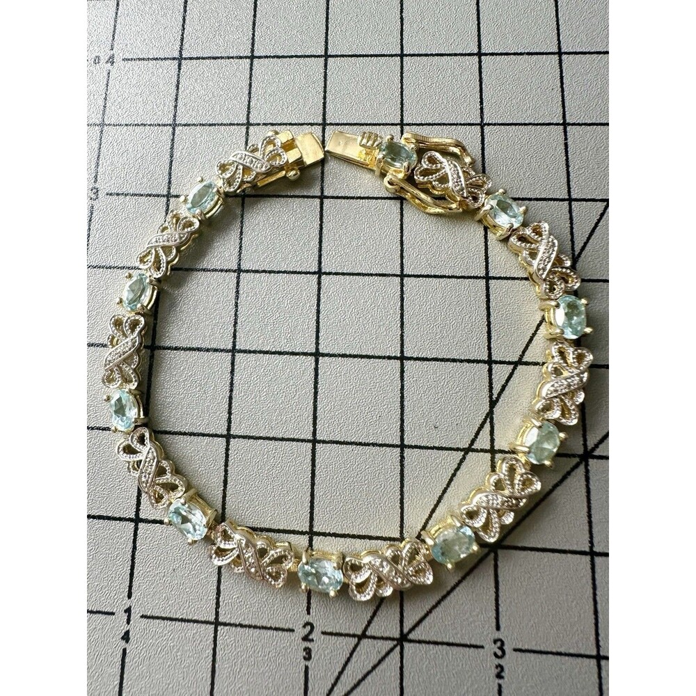 Vintage HAN Sterling 925 Blue Topaz Tennis Bracelet Gold Vermeil 7.25”